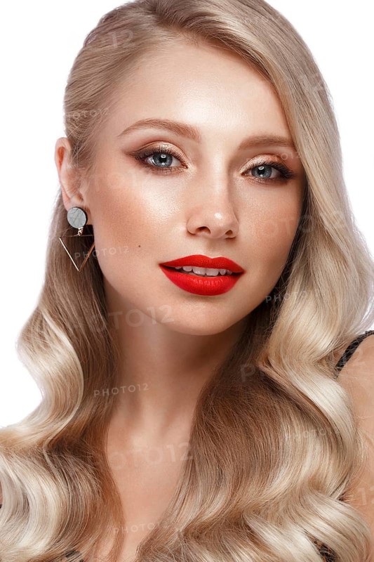Beautiful blonde in a Hollywood manner with curls