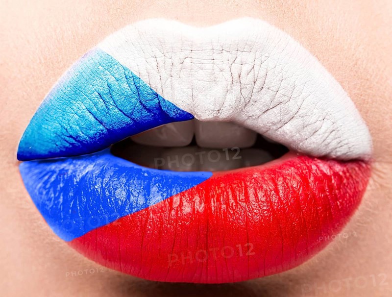 Female lips close up with a picture of the flag of Czech Republic. white