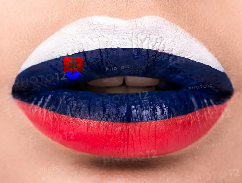 Female lips close up with a picture of the flag of Slovakia. Blue