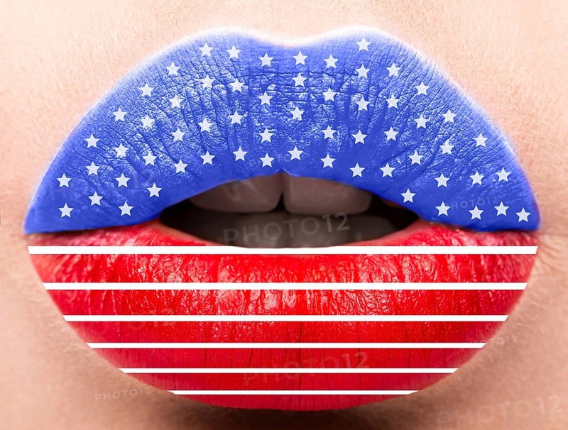 Female lips close up with a picture of the flag of United States of America