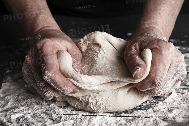 Cooking dough by elderly woman cook hands for homemade pastry bread