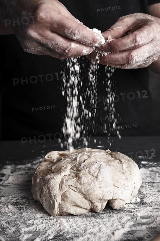 Cooking dough by elderly woman cook hands for homemade pastry bread