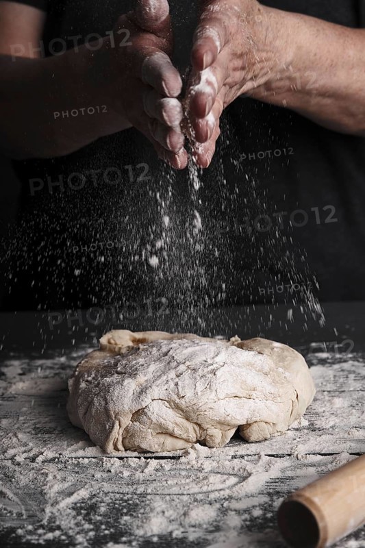 Cooking dough by elderly woman cook hands for homemade pastry bread
