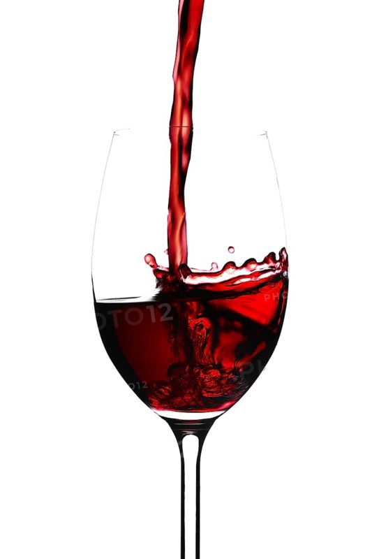 Red wine in a glass isolated on white background