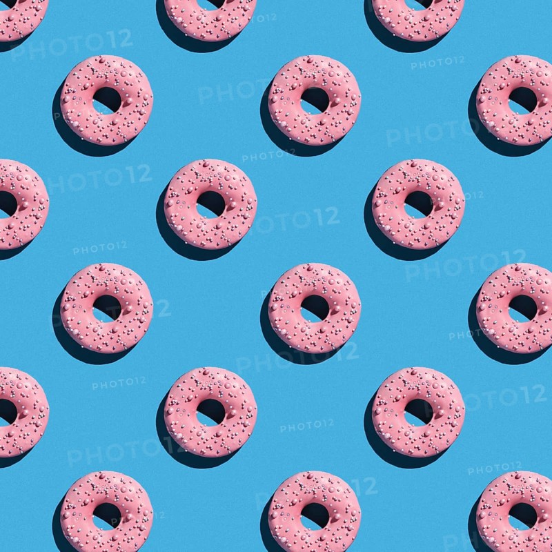 Sweet donuts pattern on a blue background