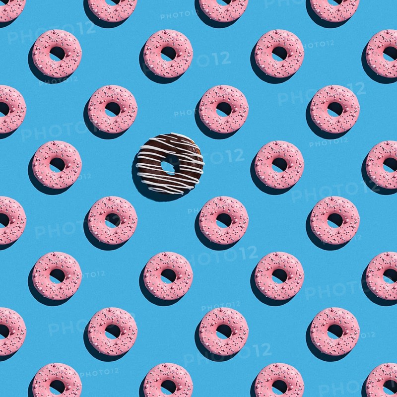 Sweet donuts pattern on a blue background