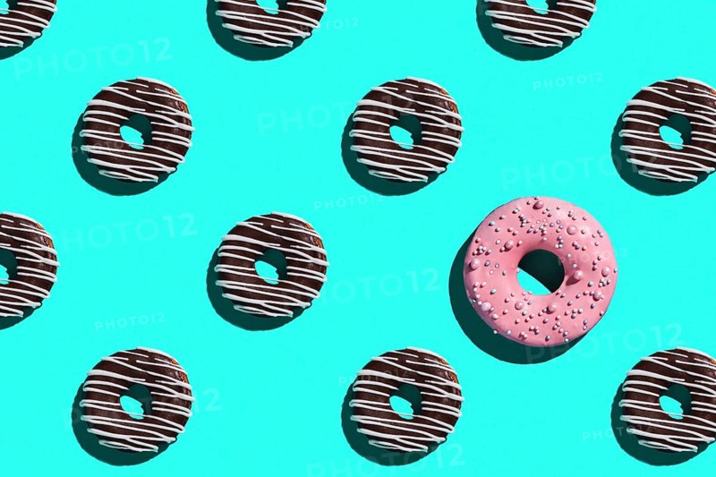 Sweet donuts pattern on a blue background