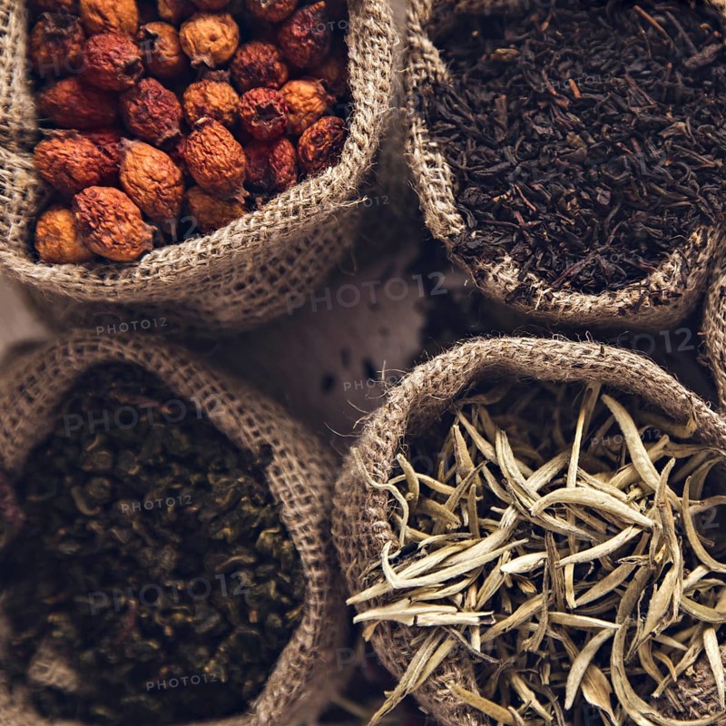 Collection of different varieties of tea in bags. White