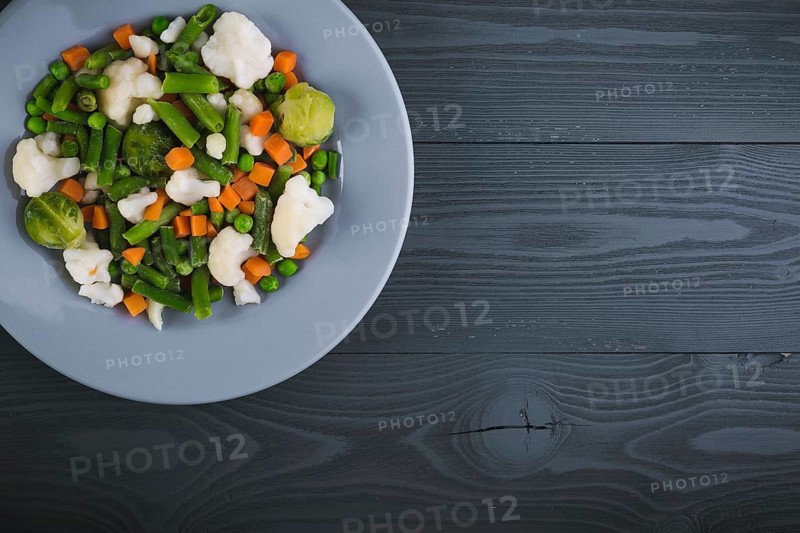 Delicious mix of vegetables on the plate. View from above