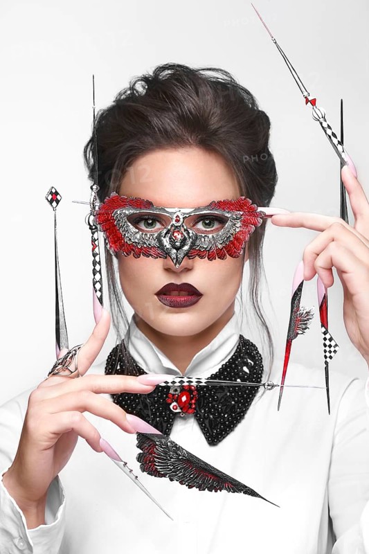 Portrait of a beautiful woman with art make-up in glamorous style