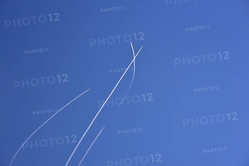 Condensation streaks from military jets during flight manoeuvres over Bavaria