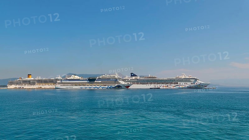 Three huge cruise ships side by side