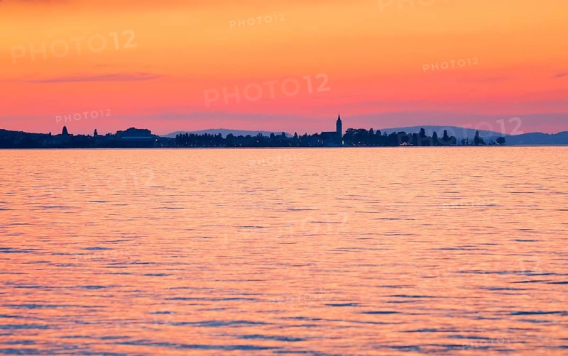Church and harbour of Romanshorn in the evening light