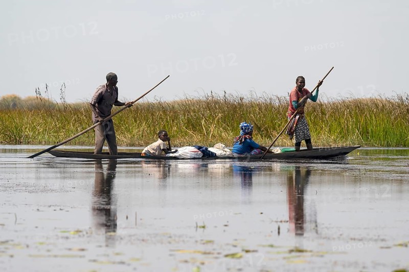 Local family in canoe