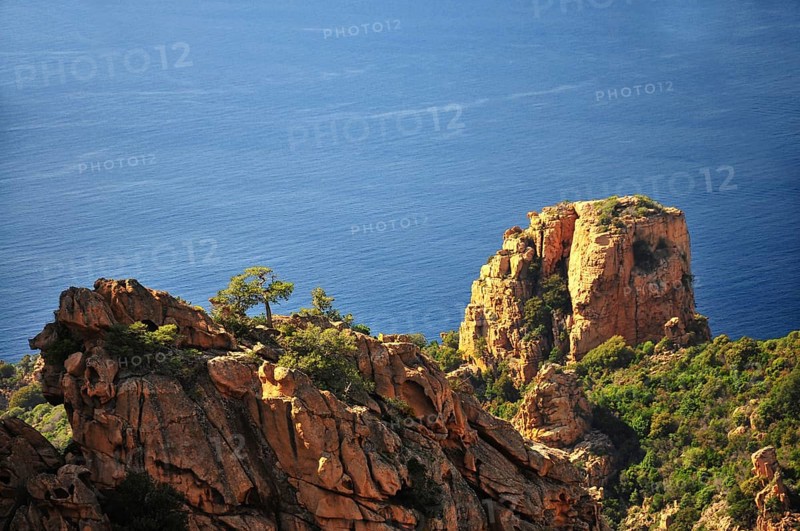 Granite rock formation on the coastal road through the Calanche de Piana in the Corsica nature park Park