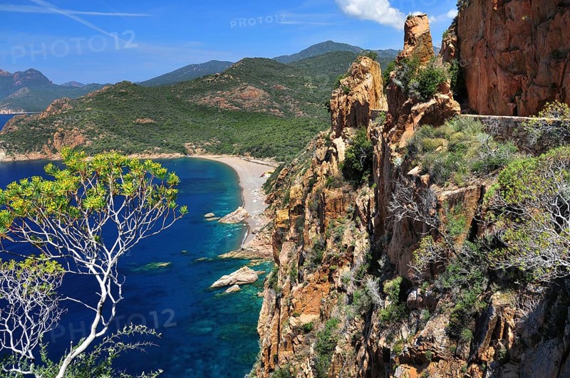 The coastal road through the Calanche de Piana overlooking the beach of Bussaglia