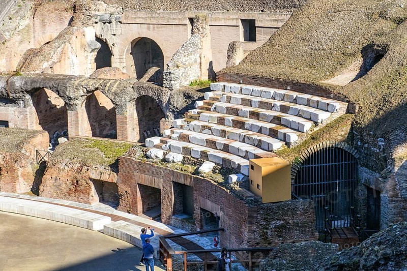 Restored historic grandstand seating marble seating tiers near east entrance of Colosseum