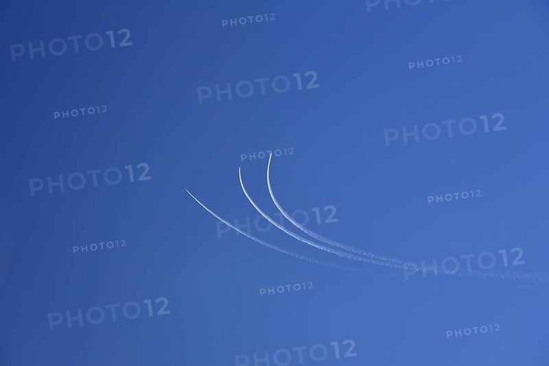 Condensation streaks from military jets during flight manoeuvres over Bavaria