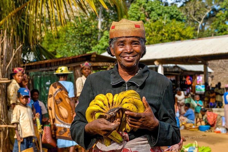 Woman presenting her bananas