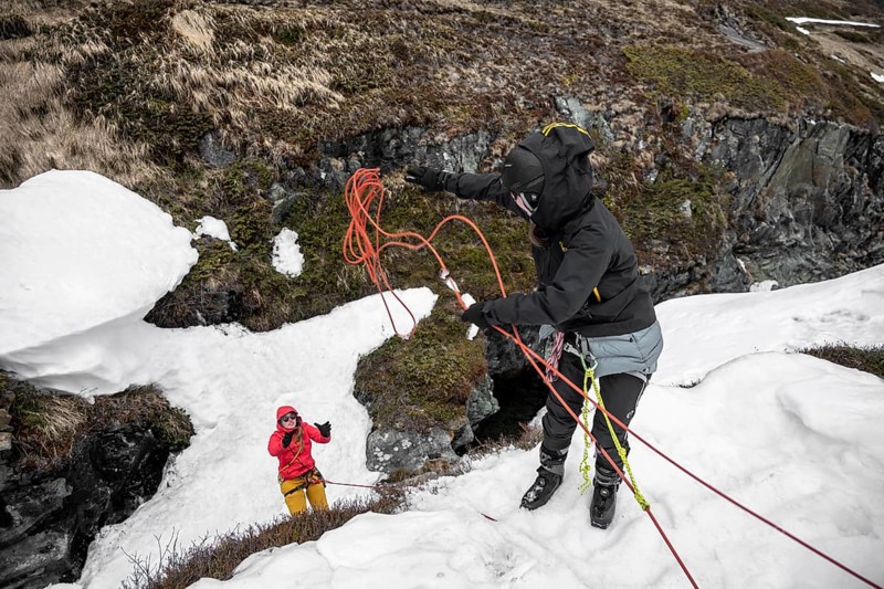 Exercise crevasse rescue for ski touring on a cliff