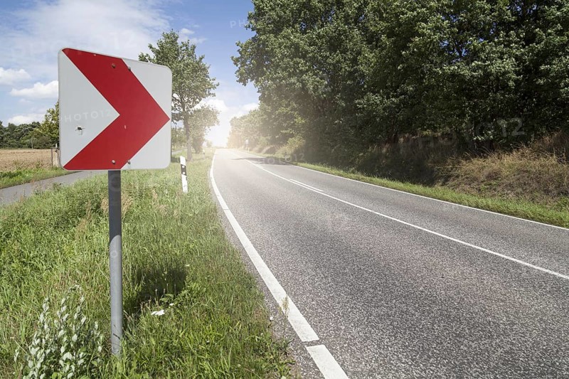 Road with sign Curve