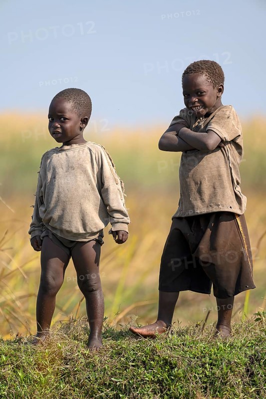 Children look on laughing