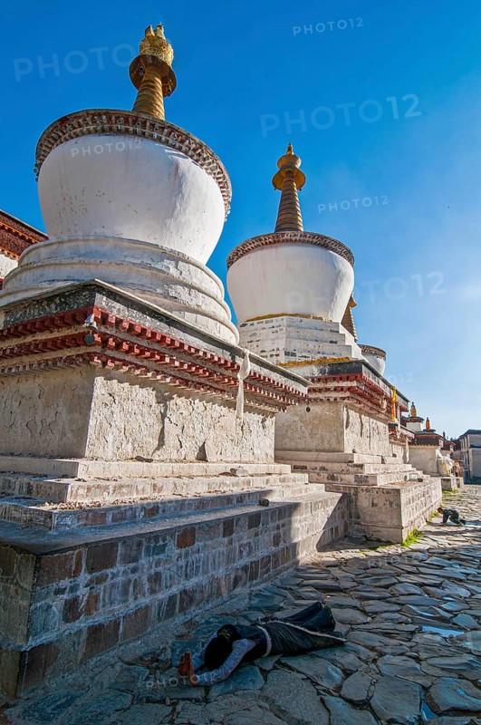 Pilgrim while praying in the Tashilhunpo monastery