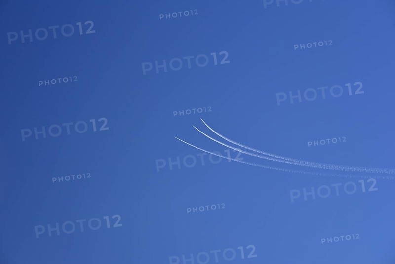 Condensation streaks from military jets during flight manoeuvres over Bavaria