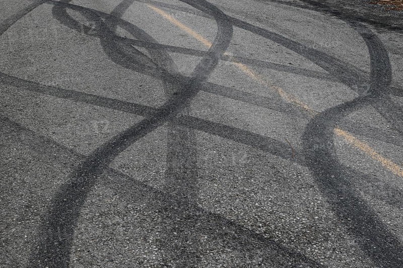 Tire prints on a country road