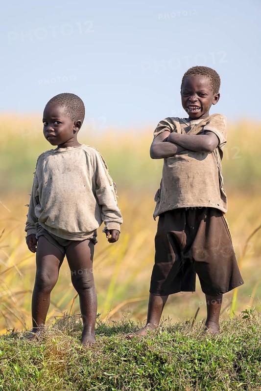 Children look on laughing