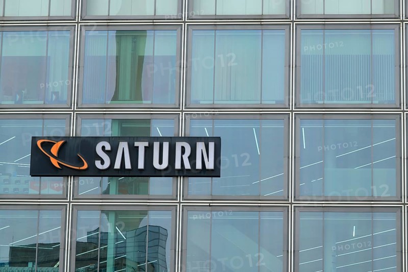Glass facade with Saturn logo