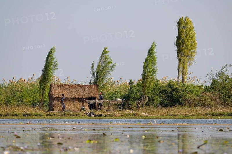 Local family with their hut