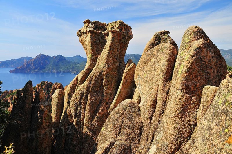 Granite rock formation on the coastal road through the Calanche de Piana in the Corsica nature park Park
