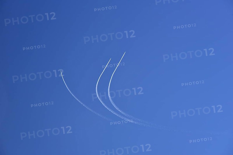 Condensation streaks from military jets during flight manoeuvres over Bavaria