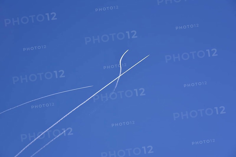 Condensation streaks from military jets during flight manoeuvres over Bavaria