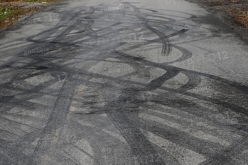 Tire prints on a country road