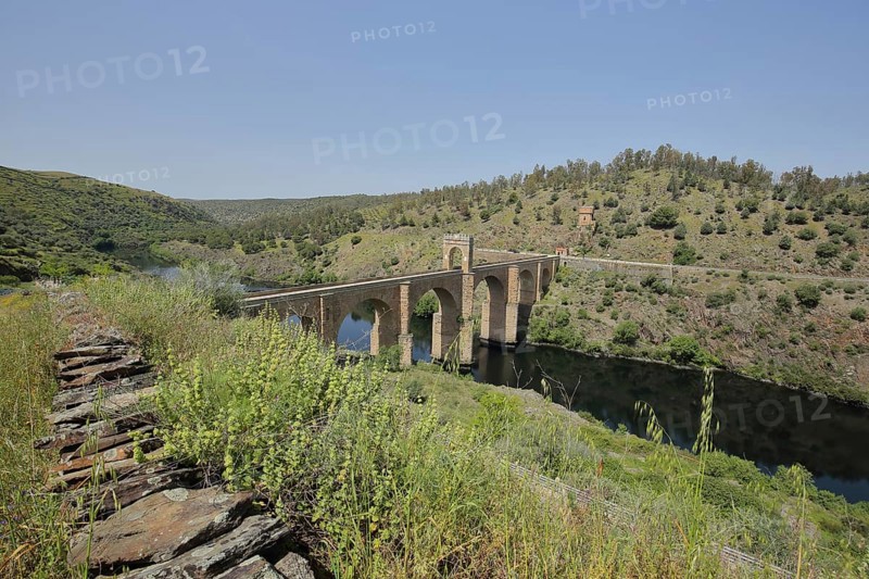 Landscape with Puente Romano and river Alcantara