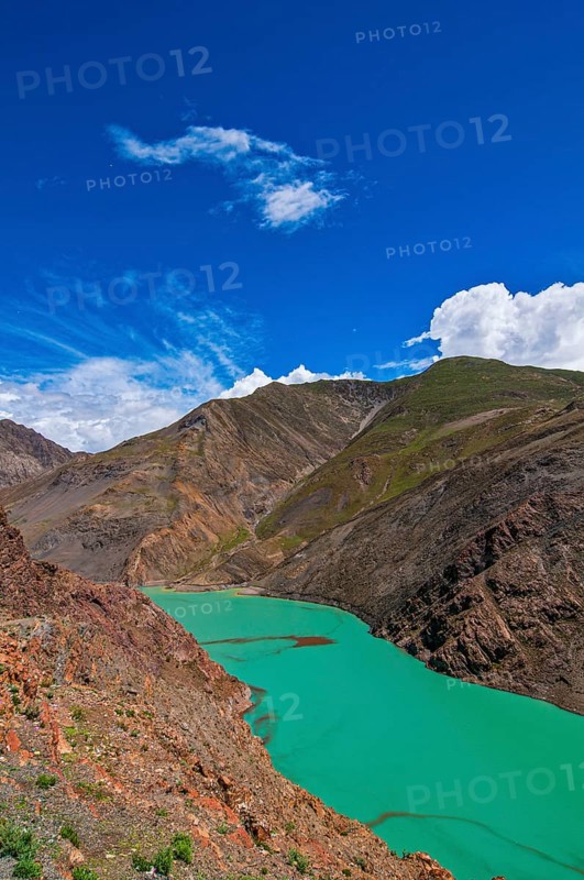 Turquoise lake on the Karo-La Pass along the Friendship Highway