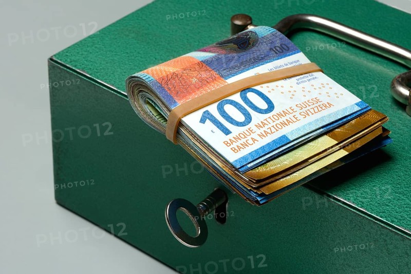 Cash box and Swiss banknotes