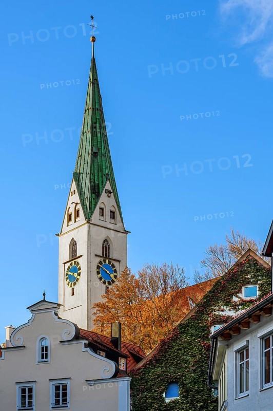 Autumn atmosphere around the tower of St. Mang Church