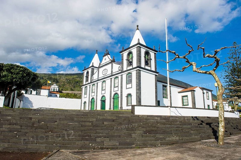 Paroquia de Sao Mateus church below Ponta do Pico highest mountain of Portugal