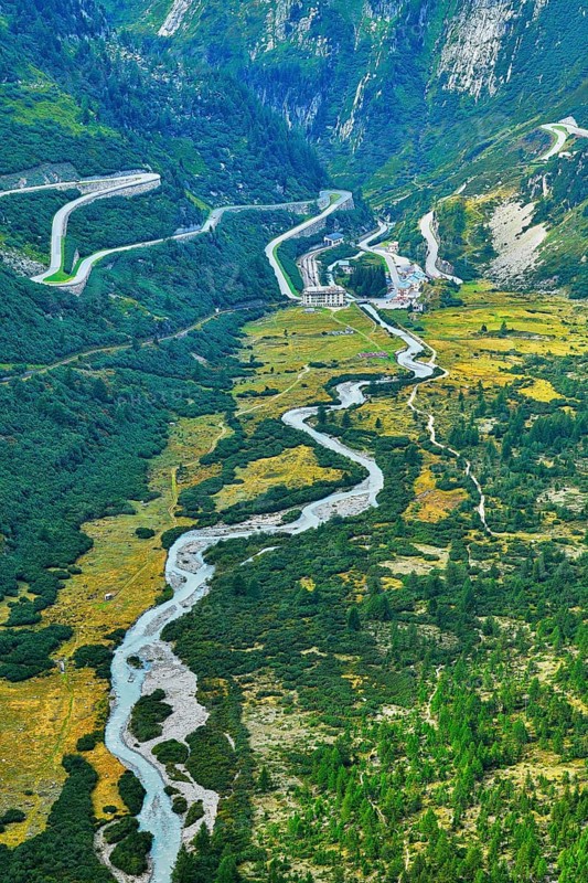 View from the Rhone glacier of the glacial stream and the pass roads