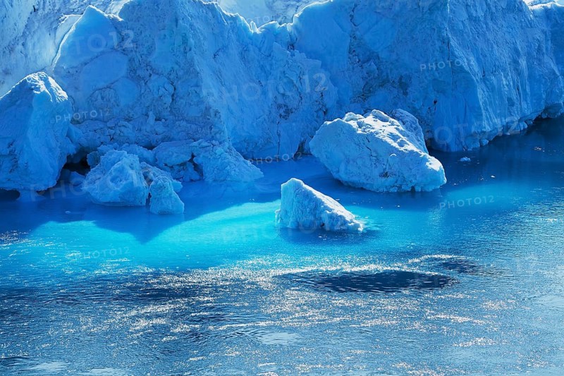 Shimmering blue icebergs