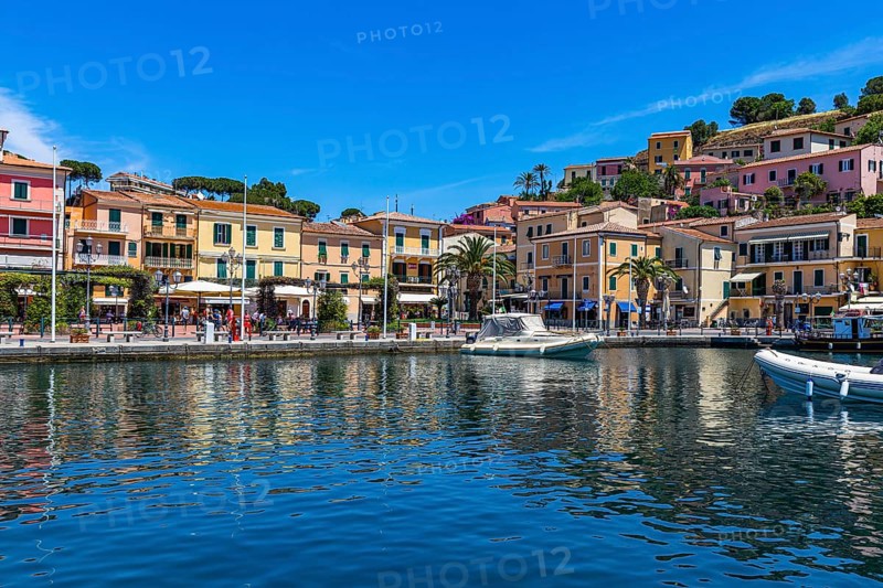 Boats anchor in the harbour of Porto Azzurro