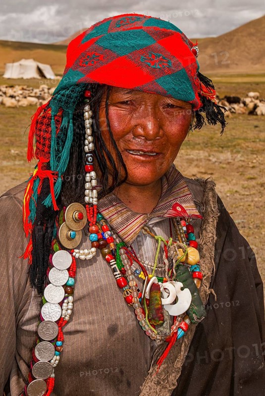 Traditional dressed women with a child