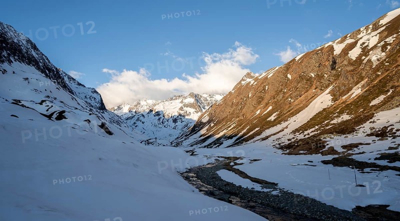Snow-covered mountains in the evening light