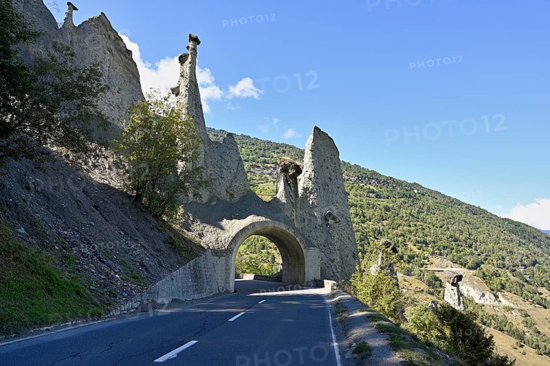 Road tunnel through earth pyramids of Euseigne