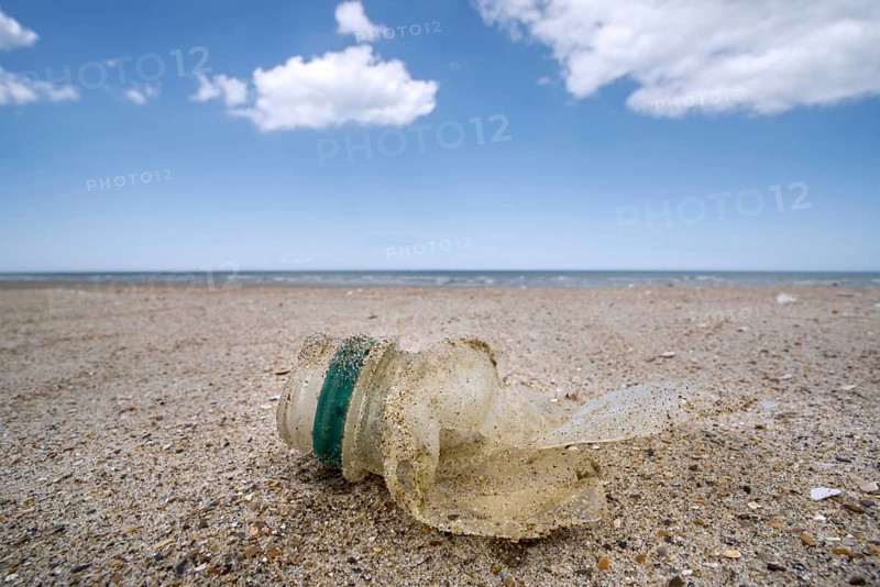 Old partly broken down plastic bottle