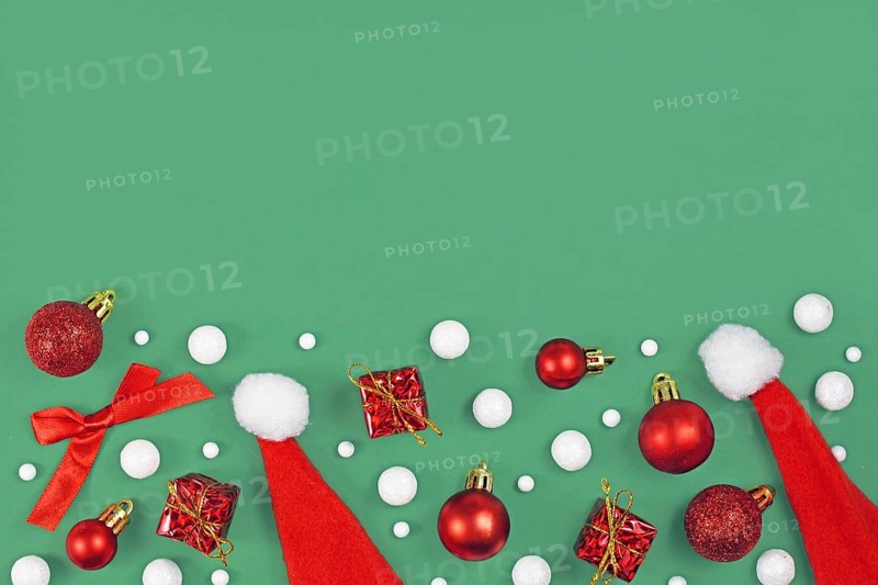 Christmas flat lay with red santa hats