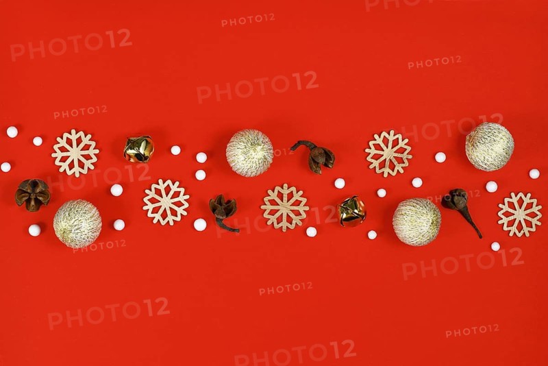 Christmas flat lay with wooden snowflake ornaments